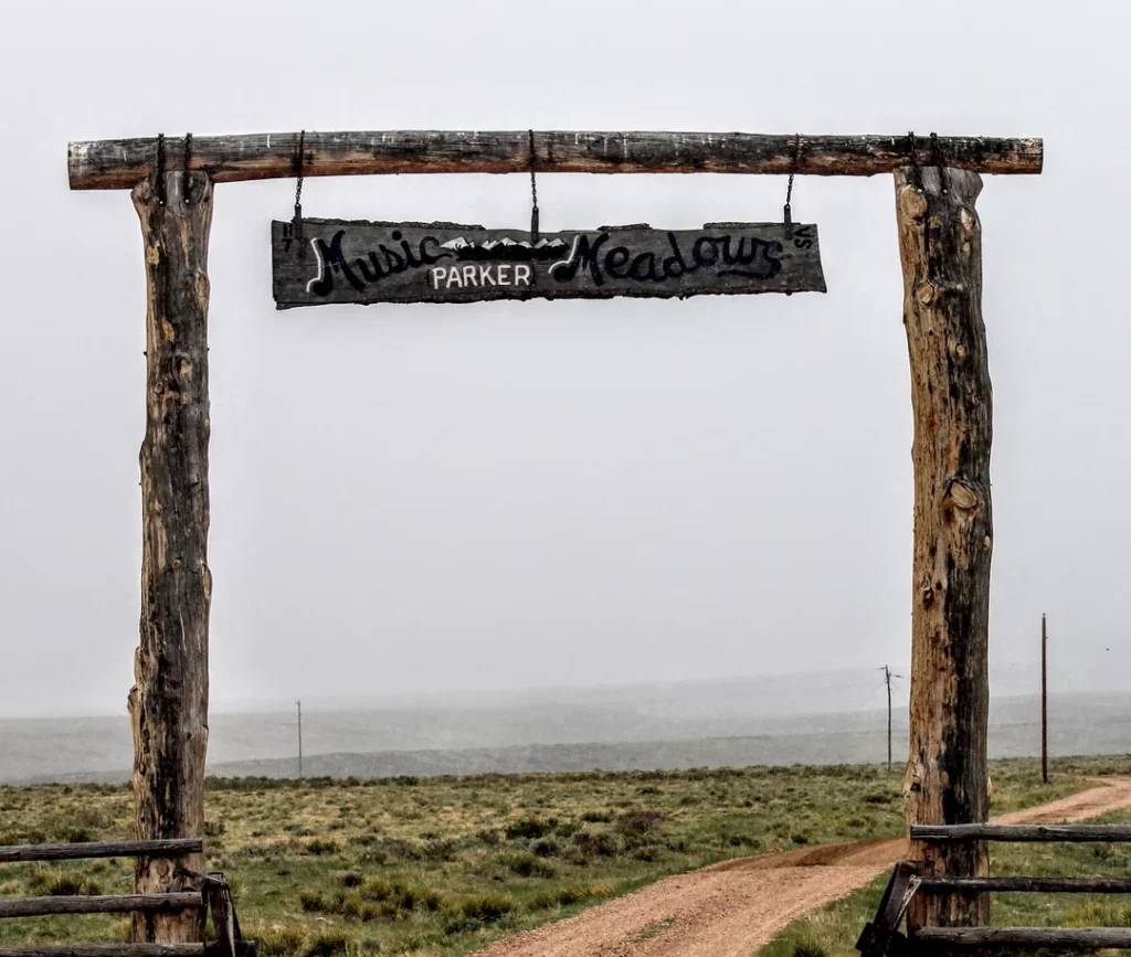 sign over the drive to music meadows ranch